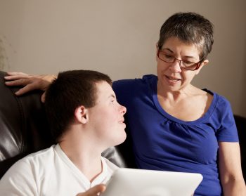 Mother and her sixteen year old son with a disability