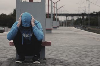 Hopeless Man in Train Station