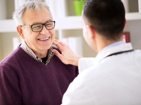 Man counseling older man