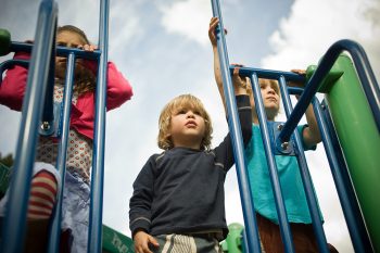 Three children in playground