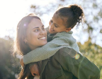 Shot of a young mother and daughter spending time at a park